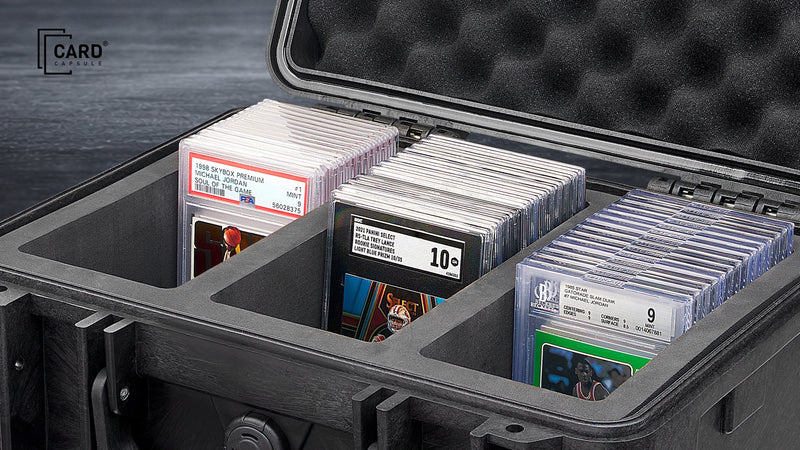 Open Card Capsule slab case with three foam compartments loaded with PSA, BGS, and SGC graded cards