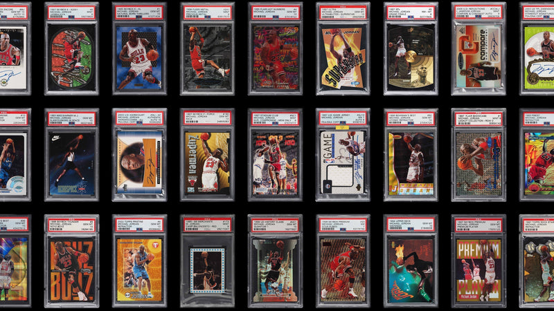Grid of PSA-graded basketball card slabs arranged in rows on a dark background