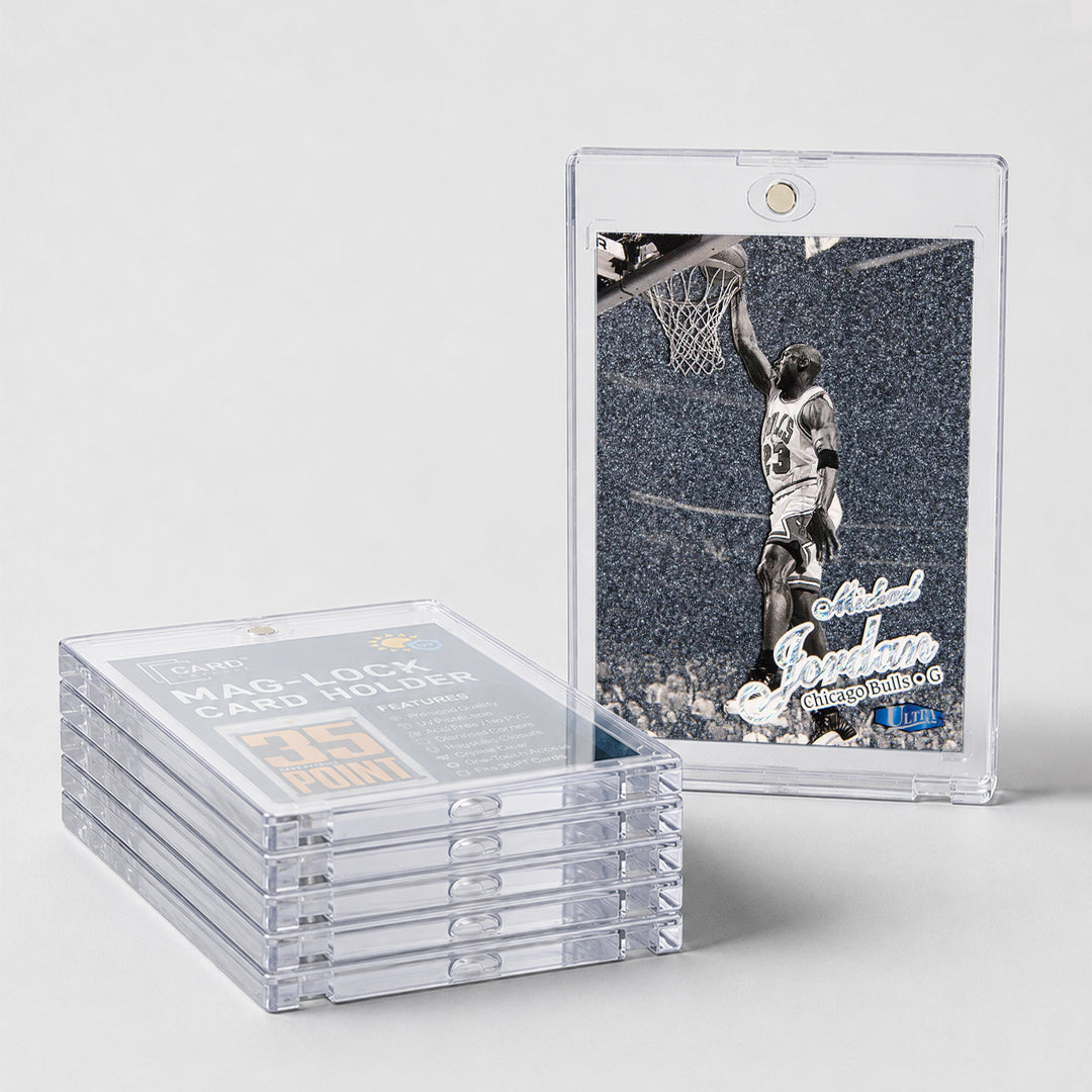 Stack of Card Capsule 35pt Mag-Lock card holders beside a black and white basketball insert card sealed in one
