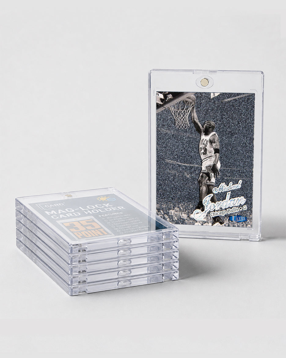 Stack of Card Capsule 35pt Mag-Lock card holders beside a black and white basketball insert card sealed in one