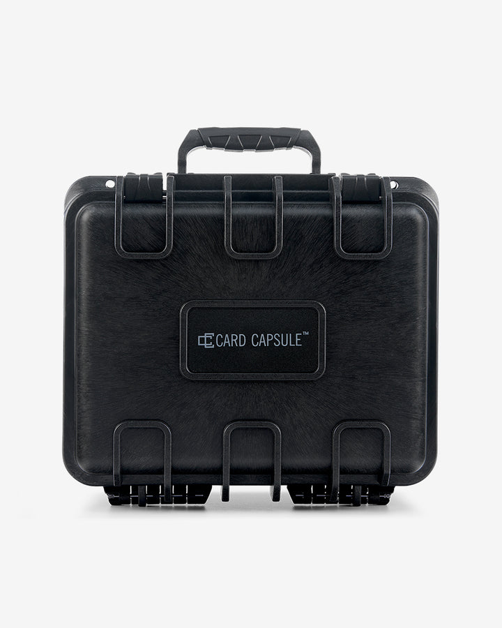 Closed Card Capsule Lite viewed straight on, showing the ribbed shell and logo panel