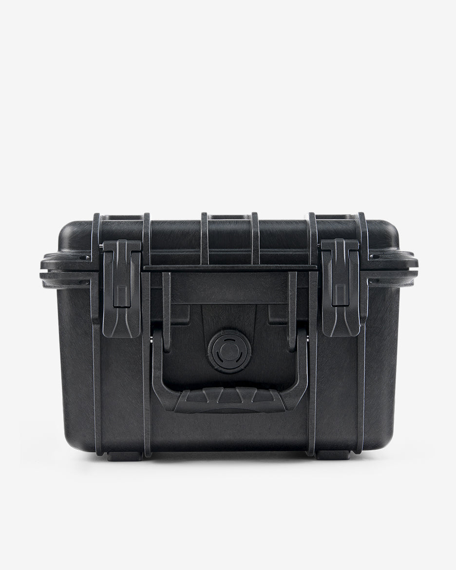Closed Card Capsule Lite at an angle, showing the carry handle and dual latches