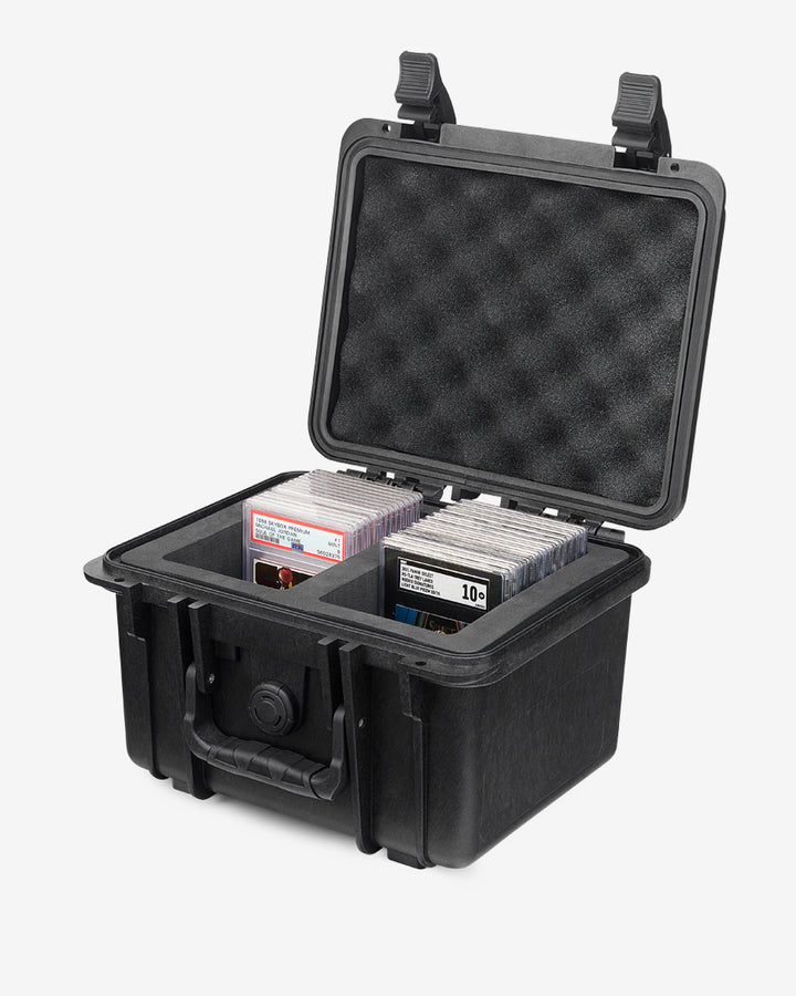 Card Capsule Lite open at an angle, loaded with graded slabs in both foam compartments