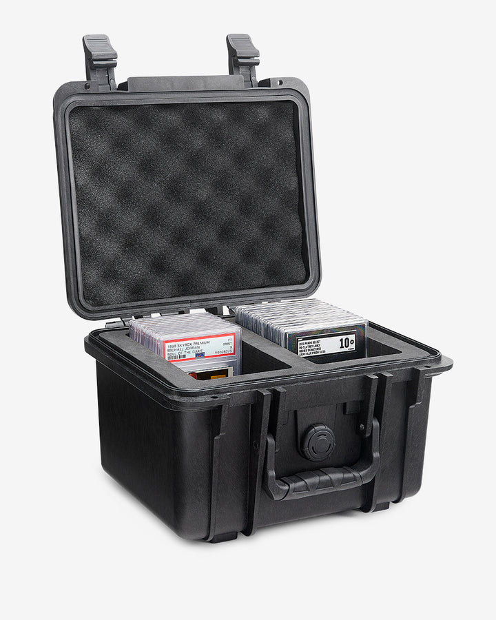 Card Capsule Lite open from the side, showing graded slabs seated in the divided foam tray