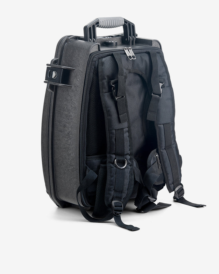 Back of the Card Capsule Slabpack showing padded shoulder straps, sternum strap, and mesh back panel