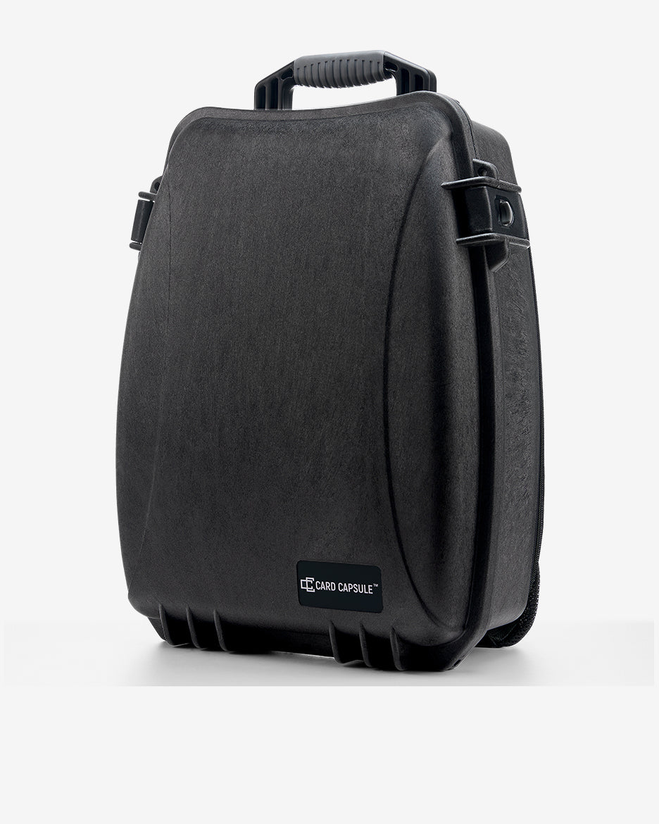 Card Capsule Slabpack from the front at an angle, showing the hard shell and top carry handle