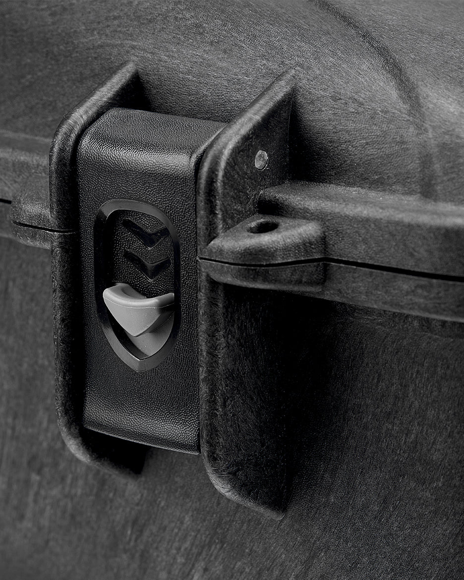 Close-up of the Card Capsule Slabpack latch and hardware on the textured shell