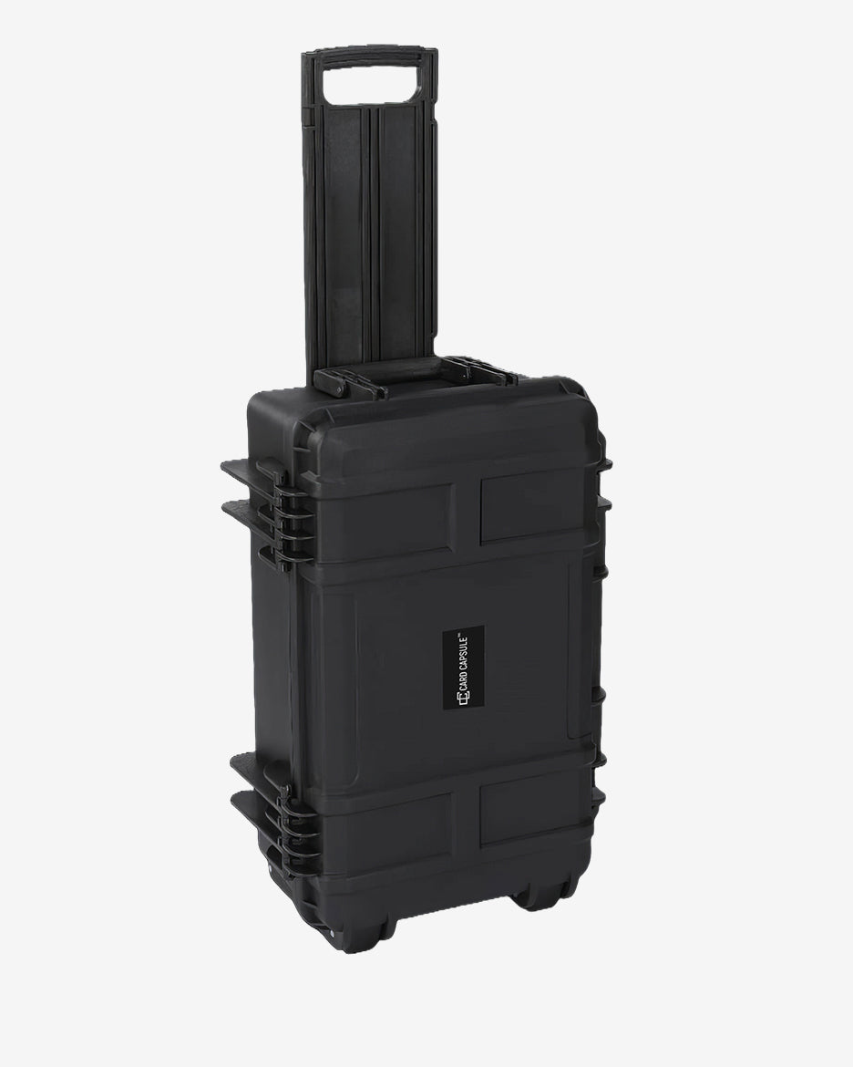 Front of the Card Capsule Trek with the handle raised, showing the latches and recessed grip