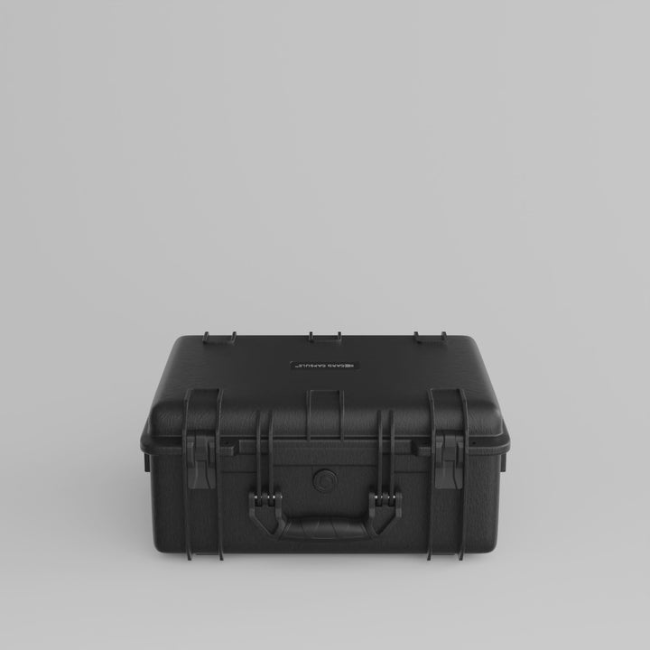 Product video of the Card Capsule Pro rotating to show the shell, latches, and interior