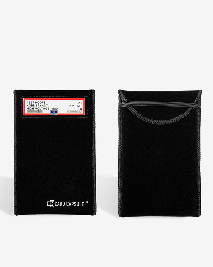 Loaded Card Capsule graded card bag beside an empty one, showing the slip-in opening