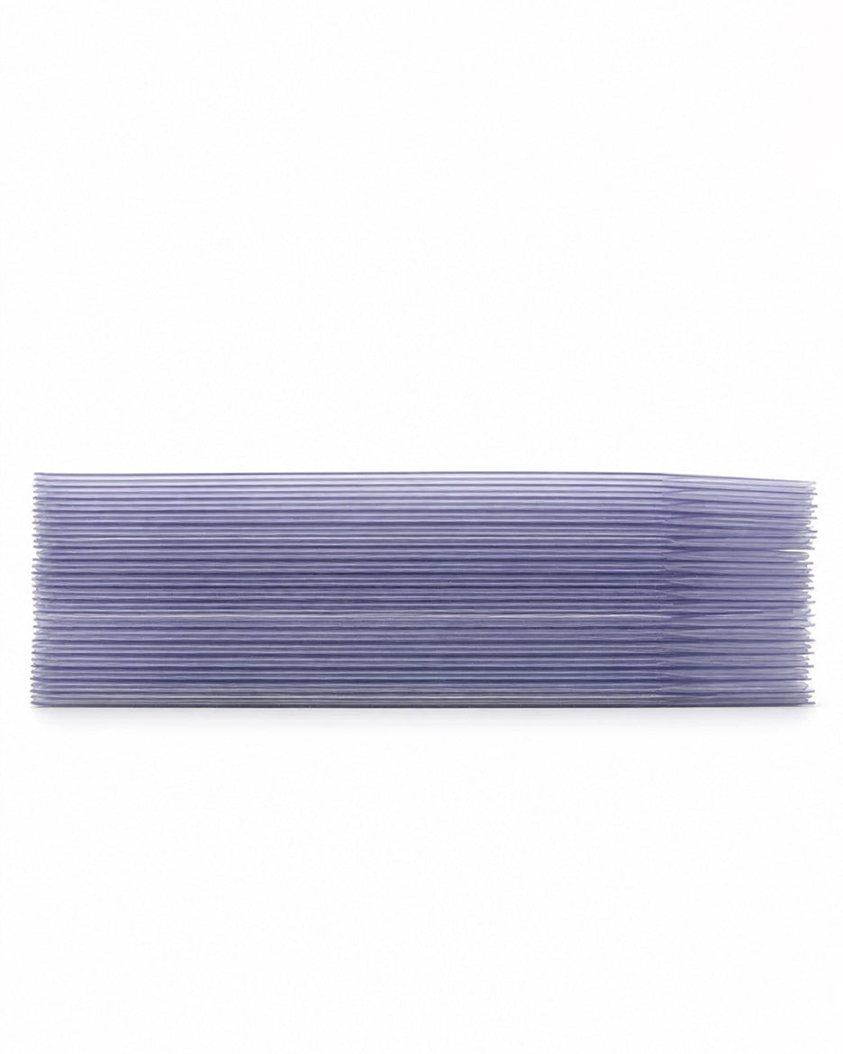 Stack of fifty Card Capsule semi-rigid card holders viewed from the side